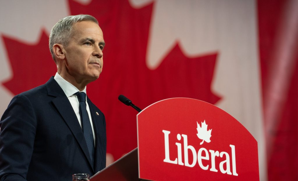Liberal Party of Canada image of The Right Honourable Mark Carney before Megavision Productions, and Client Scout e-Branding performed Advanced Image Cloning for My e-Canada Word On The Street Investigative News Exposé